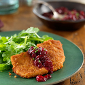 Ginger-Crusted Pork Cutlets with a Cinnamon Orange-Cranberry Chutney and Wilted Arugula